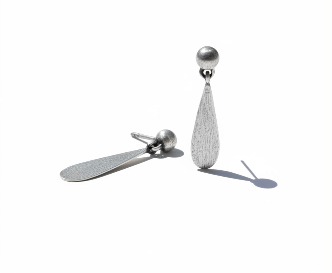 One Up, One Down Tear Drop Stud Earrings